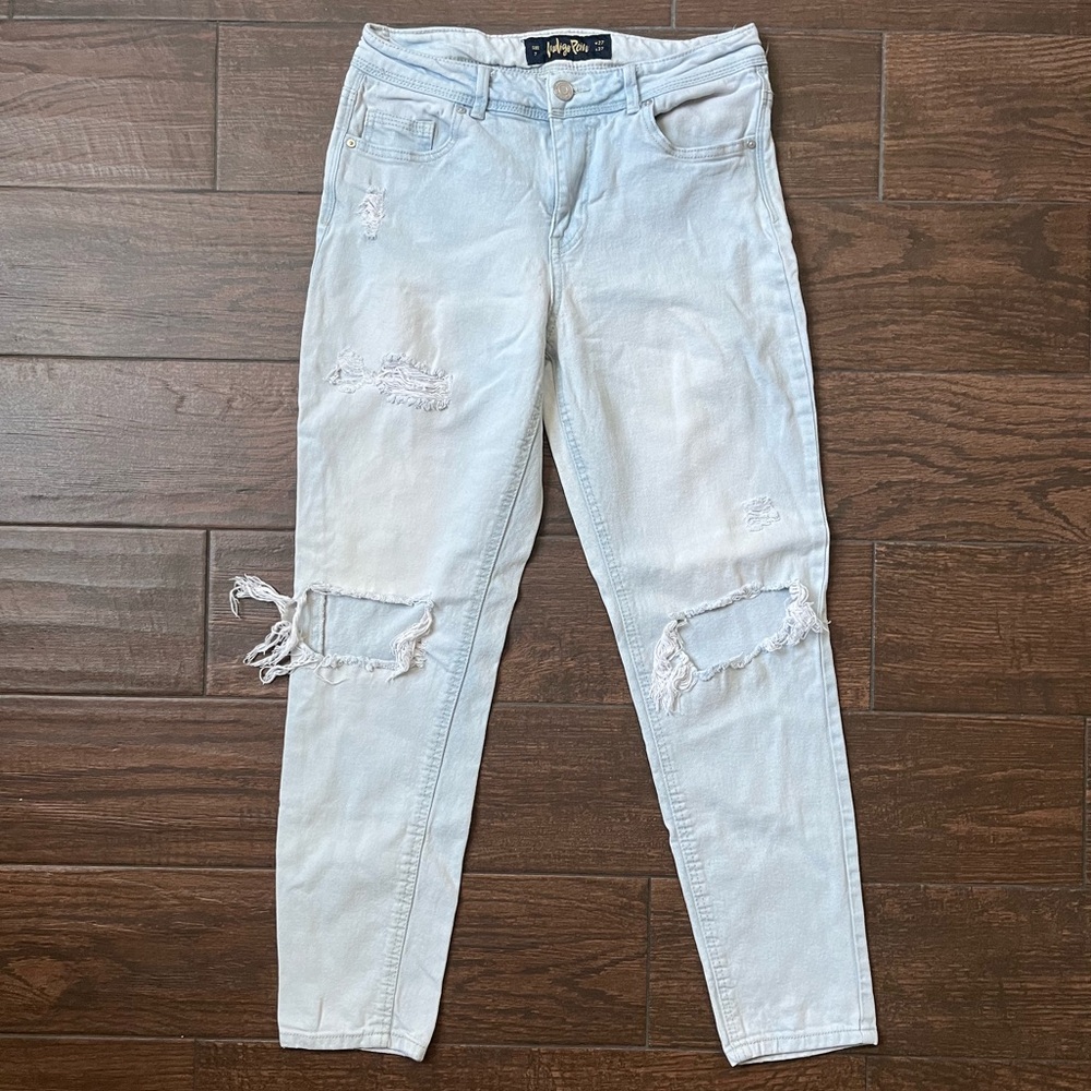 Washed super light blue distressed denim jeans